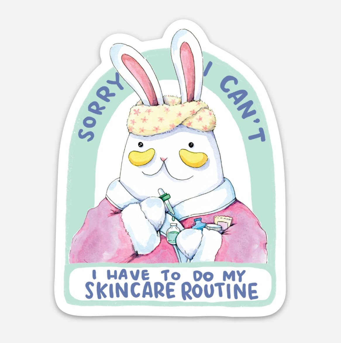 Sticker with an illustration of a white bunny wearing a pink bathrobe, a headband, undereye patches and holding skincare products. The sticker has the text 'Sorry I can't' and 'I have to do my skincare routine'.