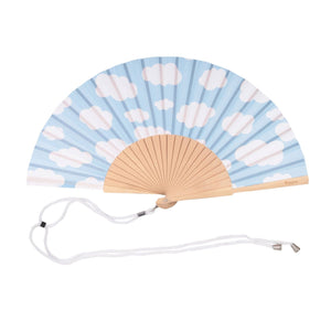 Handheld fan with wooden ribs and a white cloud design on a blue background. The fan is attached to a white lanyard to wear around your neck. 