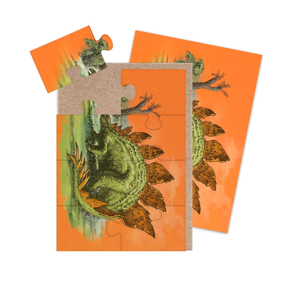 Jigsaw puzzle with illustration of a green Stegosaurus on an orange background.
