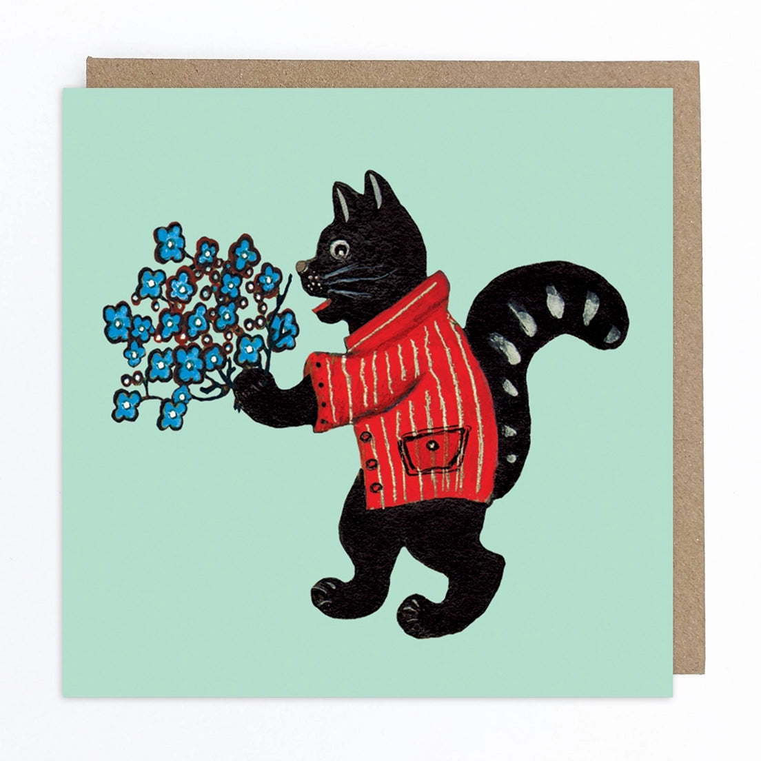 Greeting card featuring a folk art style illustration of a black cat wearing a red striped shirt and holding blue flowers on a light blue background. 