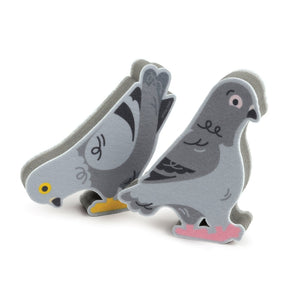 Image of two pigeon-themed kitchen sponges on a white background.