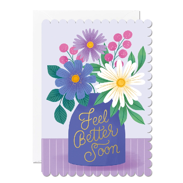 Greeting card with a scalloped edge featuring a bouquet of flowers in a purple vase on a purple background with the text 'Feel Better Soon'.