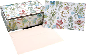 Floral-patterned card with a matching box on a white background