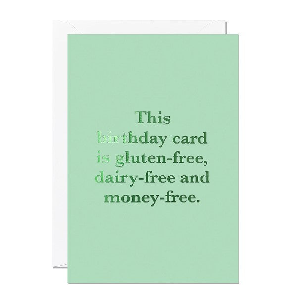 A green birthday card with the text 'This birthday card is gluten-free, dairy-free, and money-free' printed on it.