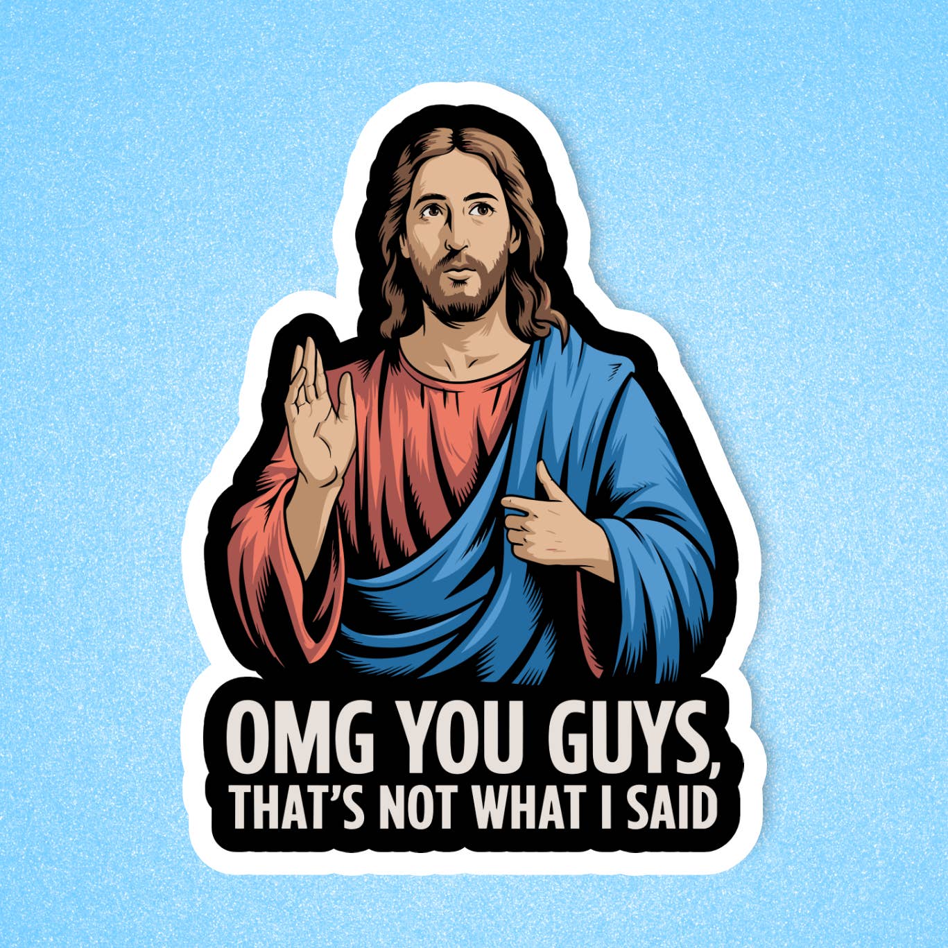 A sticker with an illustration of Jesus wearing blue and red robes. He holds a hand up in front of him. The text 'OMG you guys, that's not what I said' is printed below the image. The sticker sits on a blue background. 