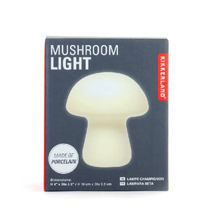 grey package box on white background. pictured on box is an off-white light in a small mushroom shape. main texts read "mushroom light" and "made of porcelain". kikkerland product