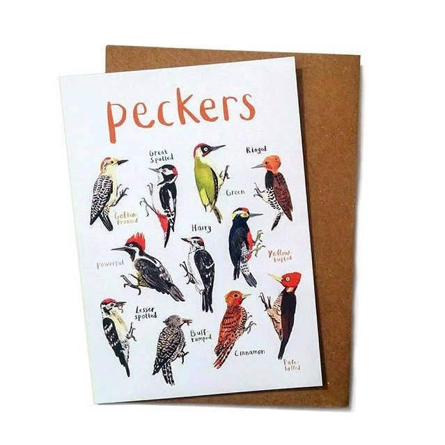 Greeting card featuring bird illustrations on a white background. The heading 'Peckers' is printed at the top of the card while each of the illustrations is labelled with smaller text. The card sits on a brown envelope against a white surface.