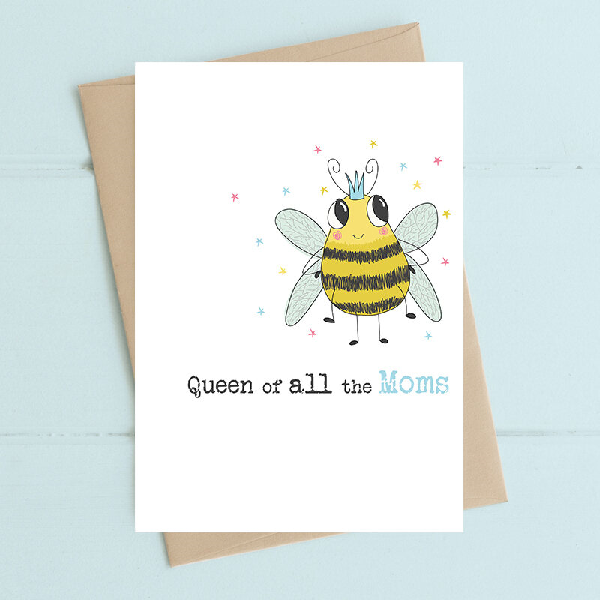 white mother's day card with a big-eyed, smiling bumble bee standing with a crown on her head. text below reads "queen of all the moms"