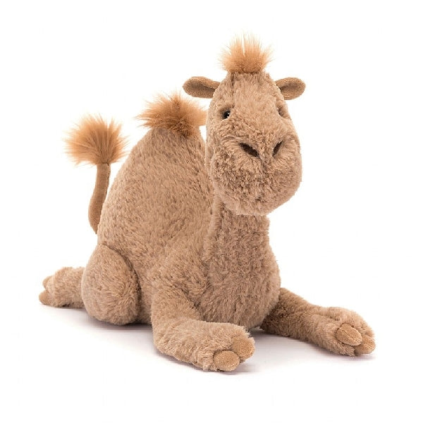 adorably soft plushie of a sitting dromadary by popular brand Jellycat.