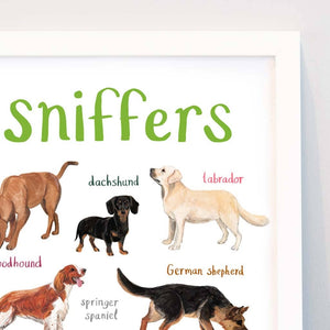 Close up of a framed art print with labelled illustrations of dogs. The text 'sniffers' is printed on top of the images.