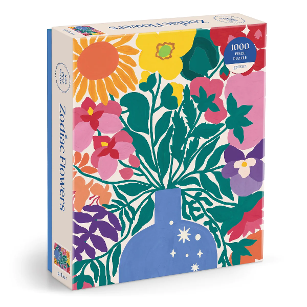 white puzzle box. the cover shows an illustration of flowers flowing out from a cute blue vase