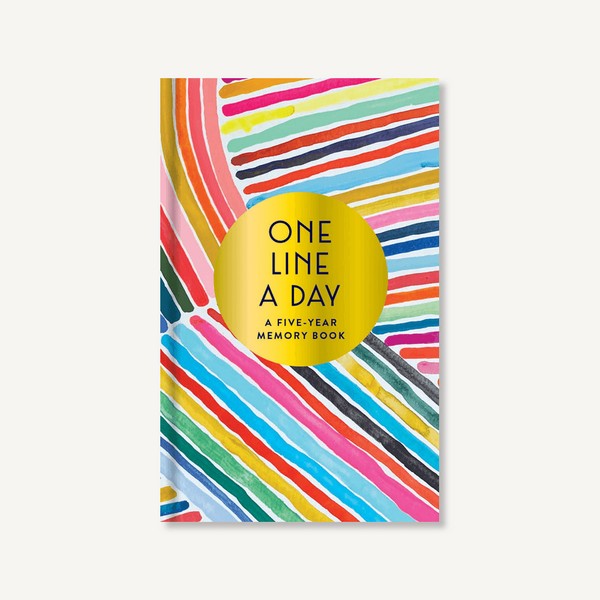Front cover of a One Line A Day memory book featuring a colourful, abstract line print on a white background.