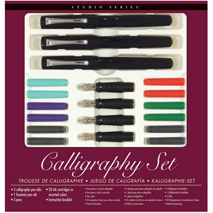 dark magenta box with clear window displaying calligraphy pens and ink tubes. bottom text reads "calligraphy set" and then details of the contents in english, french, spanish, and german