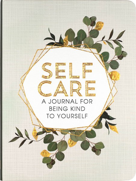 light grey notebook with a fine weaved texture. gold and green leaves decorate gold-lined hexagonal shapes all tilted into one another. centre text reads "self care a journal for being kind to yourself"