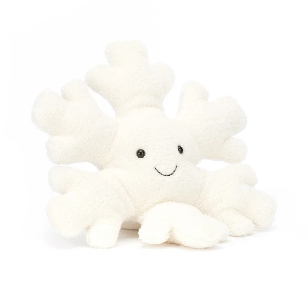 adorably soft plushie of a smiling snowflake by popular brand Jellycat.
